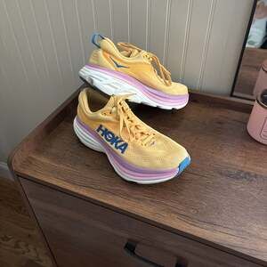 HOKA Women's Bondi 8 Running Shoes in Impala / Cyclamen